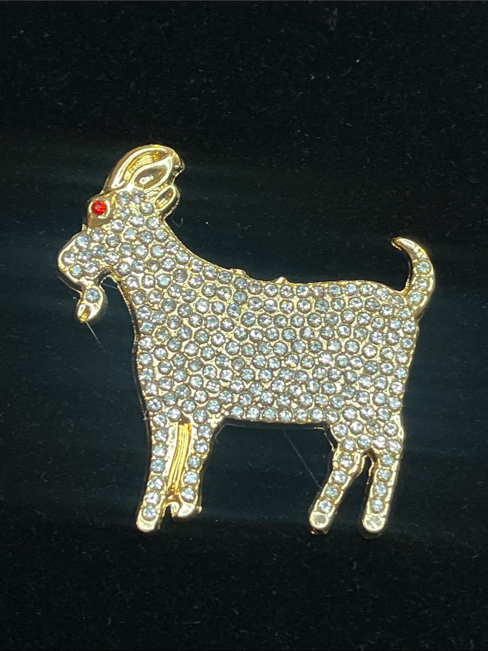 Gold-Tone Crystal Goat Brooch with Red Eye